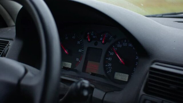 Close-Up Of Car Dashboard, Speed Gauge And Fuel Gauge.