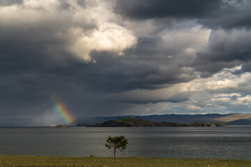 Rainbow over the Maloe More Strait. Lake Baikal