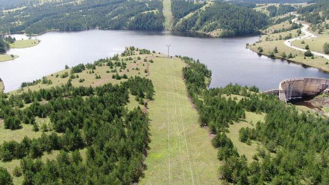 Zlatibor Gold Gondola Route Above Artificial Ribnicko Lake Toward Tornik Summit, Serbia. Aerial View of Cables and Towers Above Landscape