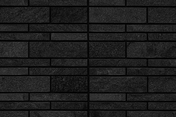 Black granite block wall pattern and background seamless