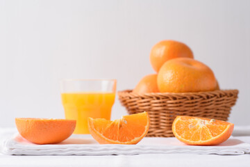 Fresh orange fruit on white background