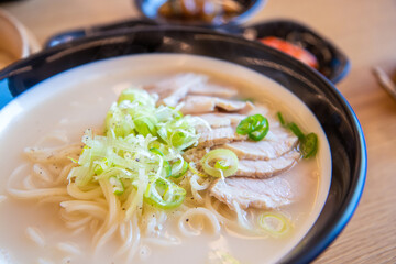 Close up image of Korean traditional food, soy milk noodle soup, Kong GukSu, with sliced meat
