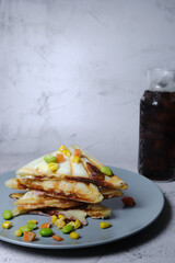 The sandwiches are on a blue plate