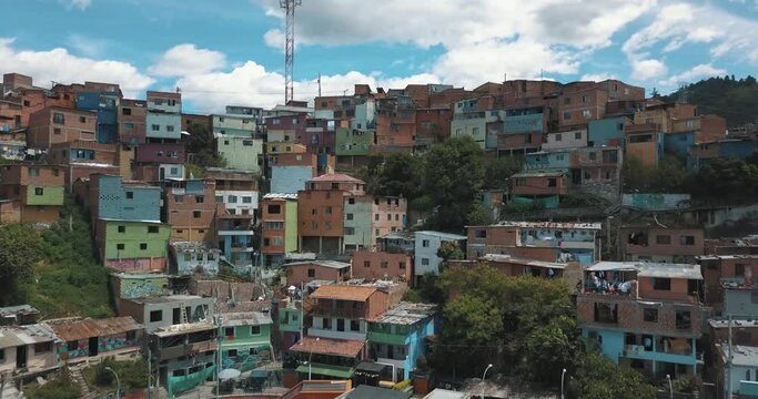 Drone aerial rising footage of houses and Escalators in Comuna 13 Neighborhood, Medellin, Colombia