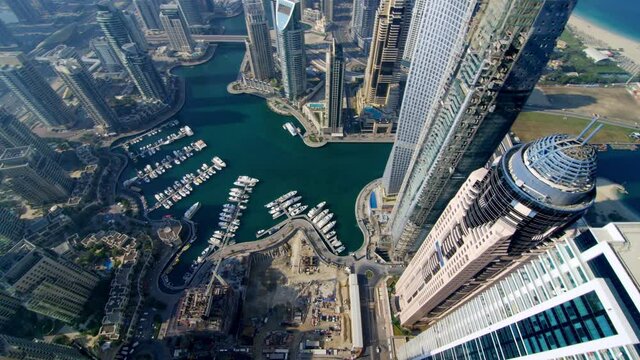 Amazing APV shot of towering skyscraper of Dubai marina 6-axis stabilized gimbal, Shotover F1, 8K, parallax.