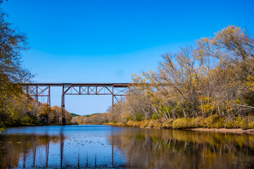 Railroad bridge crossing the Kettle River at Quarry Rapids Robinson State Park in Minnesota