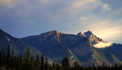 Naklejka na ściany i meble Alberta, Canada - Mountain Peaks looming over Snaring Overflow Campground
