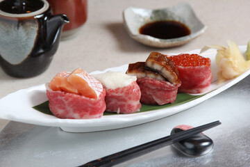Japanese cuisine: Beef sushi Place on a white ceramic plate and serve.