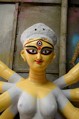 Clay idol of Goddess Devi Durga is in preparation for the upcoming Durga Puja festival at a pottery...