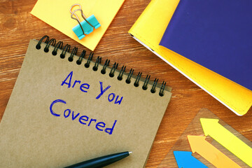 Business concept about Are You Covered with inscription on the piece of paper.