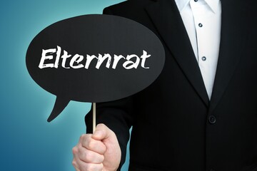 Elternrat. Mann (Anwalt) hält Schild mit Beschriftung. Sprechblase mit Text (deutsch). Hintergrund blau