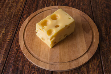 cheese on a wooden board