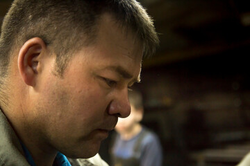 Obraz premium Close-up portrait of a man in the workplace