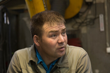 Close-up portrait of a man in the workplace