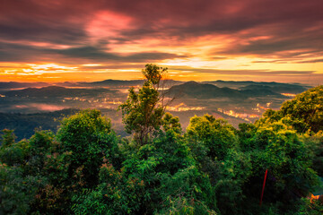 Natural high angle panoramic background With an atmosphere surrounded by mountains and trees, with a blurred wind, cool