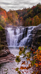 waterfall in autumn forest