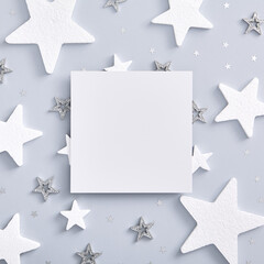 White and silver star with paper blank