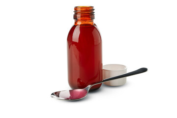 Medicine bottle and spoon with syrup isolated on white background