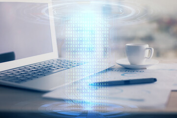 Double exposure of table with computer on background and data theme hologram. Data technology concept.