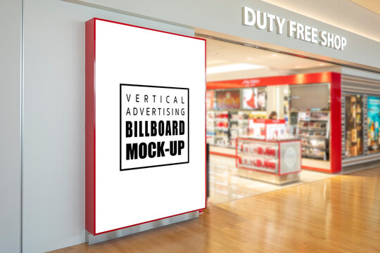 Mock up blank large billboard near entrance of duty free shop