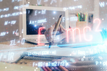 Science formula hologram over woman's hands taking notes background. Concept of study. Double...