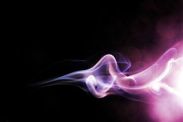 Purple smoke on black background