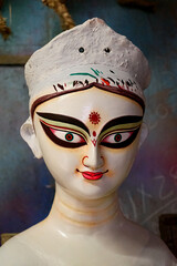 Clay idol of Goddess Devi Durga is in preparation for the upcoming Durga Puja festival at a pottery...