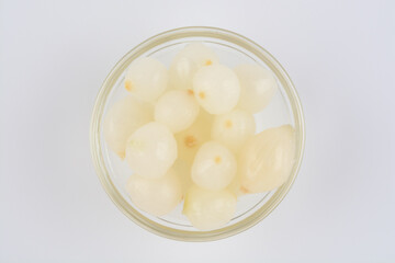 Chives, pickled in a glass bowl
