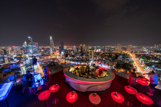 Ho Chi Minh City / Vietnam - October 2019: Nightscape Of Ho Chi Minh City And Rooftop Bar.