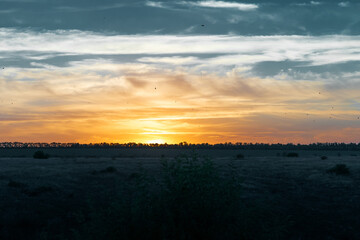 Beautiful bright abstract river sunset background. Beautiful illumination of the sky