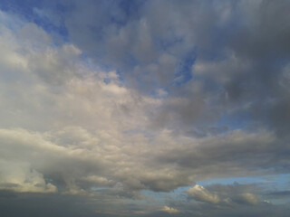 Beautiful white fluffy cloudy sky background,
