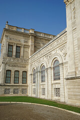 Fototapeta premium Exterior Neoclassical architecture and royal facade building design of 'Dolmabahce imperial palace' located along the European shore of the Bosphorus Strait- Besiktas, Turkey