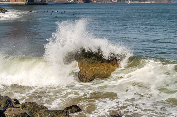 The wave hits the stone, San Francisco.