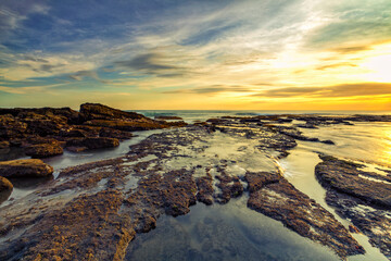 coral and warm sky at Mangening Beach Bali