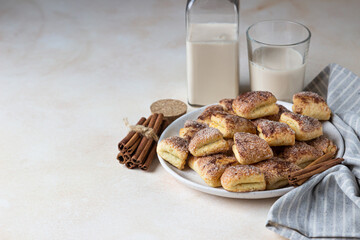 Triangles or angles cottage cheese cookies with sugar and cinnamon. Crows feet cookies. Ideas for children dessert or snack.