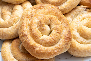 Sweet cinnamon rolls on table