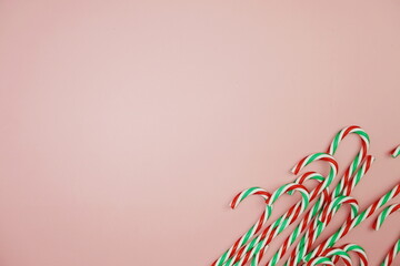 Christmas Candy can ornament on pink background