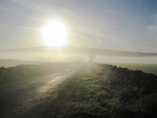 sunrise and mist over the valley.