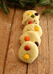 Homemade Christmas cookies on a wooden background.
