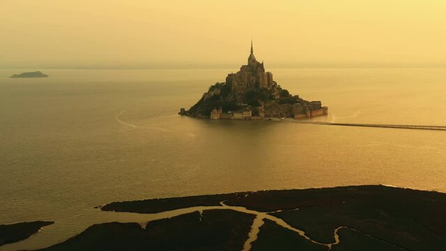 Mont Saint Michel at sunrise aerial view Normandy France