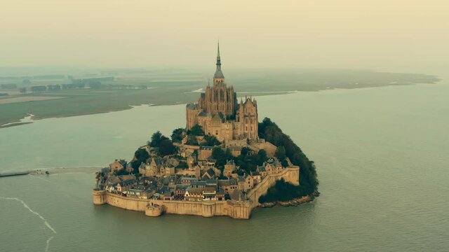Mont Saint Michel at sunrise aerial view Normandy France