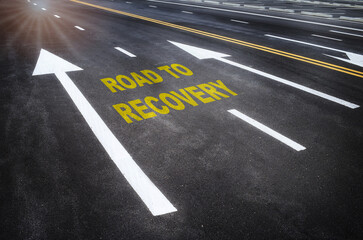 Road to recovery word on road with white arrow. Business cycle stage concept and business challenge...