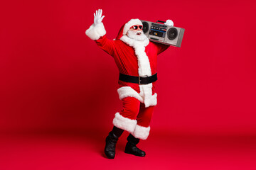 Full length photo of pensioner old man white beard raise hand hold retro radio carefree wear x-mas...