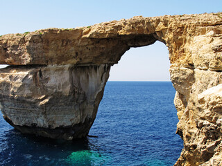 Fototapeta na wymiar Malta cliffs that formed an arch of stone