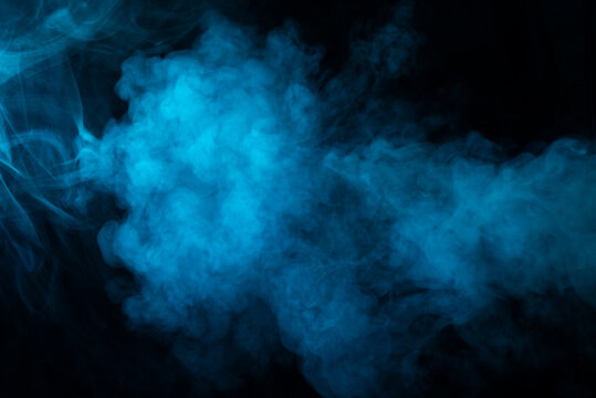 Texture of blue smoke on black background
