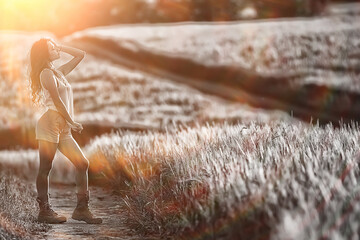 sexy girl in a t-shirt in a field / summer look, a beautiful young adult sexy model