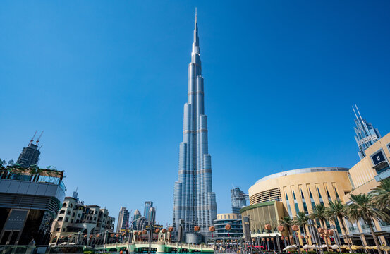 Dubai / UAE - February 2019: The Burj Khalifa and the Dubai Mall at daytime. 