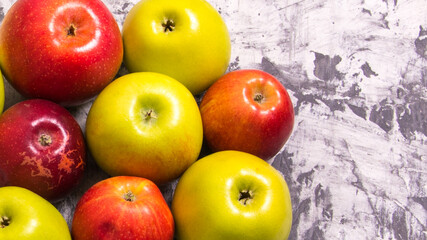 A bunch of red and green apples on a black and white background,close-up,background,Wallpaper,postcard,advertising