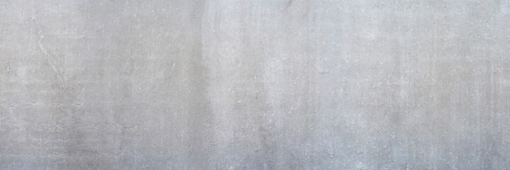 Texture of a smooth gray concrete wall as a background or wallpaper