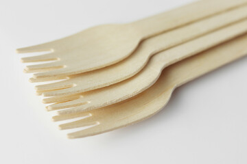 Wooden forks isolated on white background.